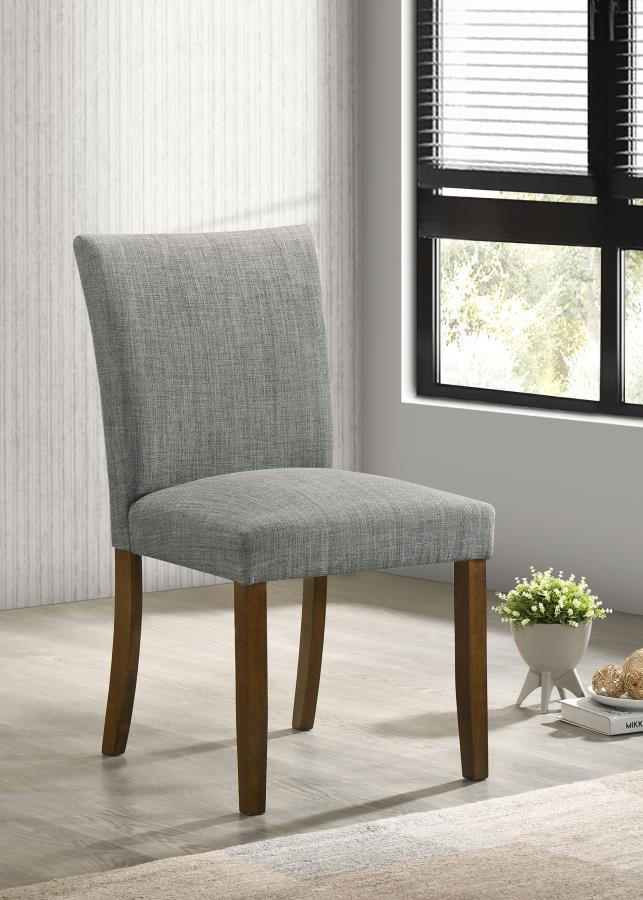 Upgrade your dining table with the fresh silhouettes and contemporary flair of this set of two modern side chairs. Each boasts an armless profile and lovely upholstery that creates the perfect touch of texture. Foam cushions provide exemplary comfort, per