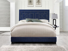 The Ishiko III bed provides a commanding presence in any room. This contemporary panel bed features a fully padded rectangular headboard with low profile footboard in a luxurious dark blue velvet. The headboard is accented with geometrically patterned nai