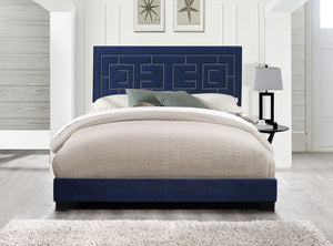 The Ishiko III bed provides a commanding presence in any room. This contemporary panel bed features a fully padded rectangular headboard with low profile footboard in a luxurious dark blue velvet. The headboard is accented with geometrically patterned nai