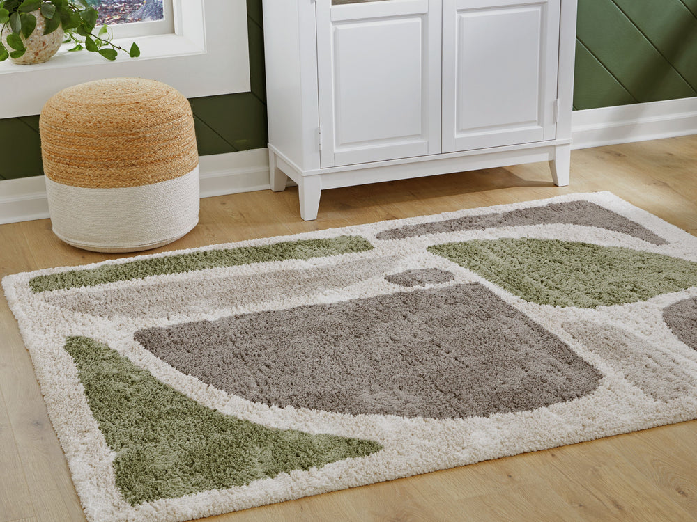 What a gorgeous medley of colors on your floor. This rugâ€™s abstract pattern aligns your space in a decidedly modern way. Its deep shag is plush beyond compare. Isnâ€™t it time you sunk your toes into something more cosmopolitan?<br/><br/><b>Product Feat