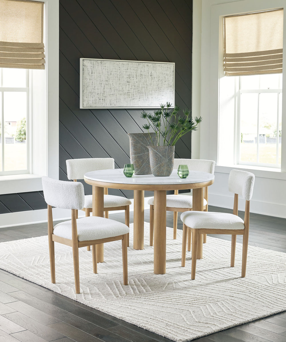 Clean lines meet cool curves with this dining set. Chunky round post legs and a natural finish lend a modern vibe, while chairs with softly textured upholstery tempt you to sit and stay awhile. What a delicious choice for a dining room update. <h4><b>Sawd
