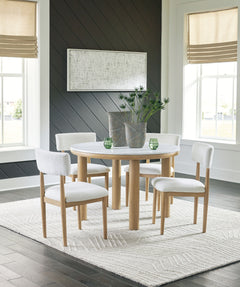 Clean lines meet cool curves with this dining set. Chunky round post legs and a natural finish lend a modern vibe, while chairs with softly textured upholstery tempt you to sit and stay awhile. What a delicious choice for a dining room update. <h4><b>Sawd