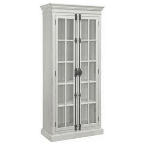 Envision a dining room graced by this tall dining cabinet, a vitrine that radiates charm with its distressed white finish, whispering tales of timeless elegance. Two glass doors unveil four shelves, ideal for displaying your cherished china. Adorned with 