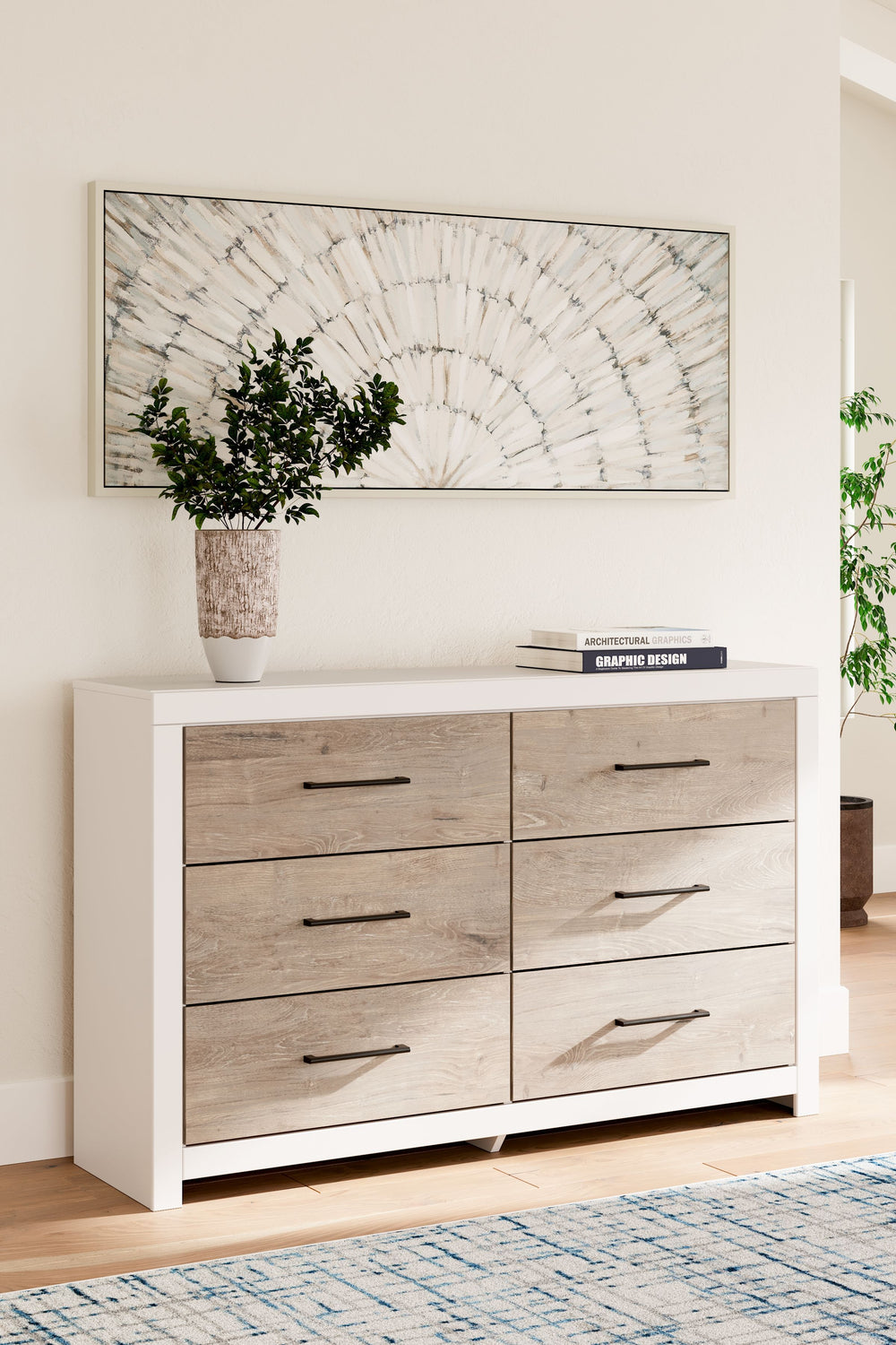Relaxed yet striking, this dresser brings casual beauty and function to your dream destination. You-'re sure to love its six spacious drawers that easily glide open and offer plenty of storage for your wardrobe and spare bed linens. A delightful two-tone 