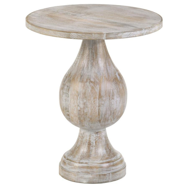 Showcasing an alluring silhouette, this modern side table offers a stylish blend of art and sophistication. A pedestal design doubles down on elegance and creates an eye-catching look. Infuse romantic charm to a living space or entryway with a table featu