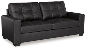 Everyday comfort meets versatile style in this sofa. The handsome hue of the goes-with-anything faux leather takes away the stress of styling, expertly pairing with your existing aesthetic. From kicking back on the weekends to relaxing post-work, living r