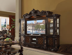 The Versailles the entertainment center was inspired by old European design. This collection features carved scrollwork accent on the bridge-'s crown. The collection pieces are carefully crafted with selected wood and veneers in Cherry Oak finish with han