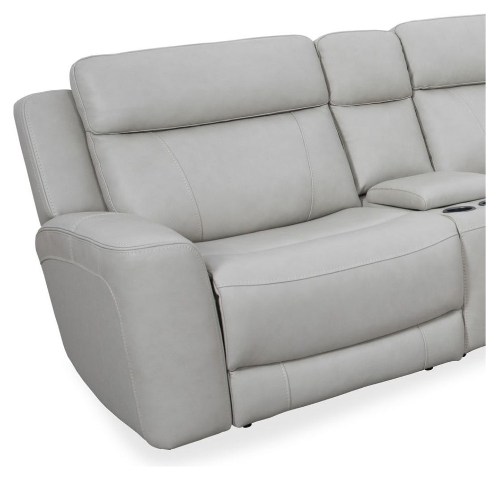 Introducing our comfortable and convenient Calgary Sectional, designed with relaxation in mind. Calgary features power recline and headrest controls, allowing you to adjust your seating position easily. The over-padded headrests provide extra comfort, and