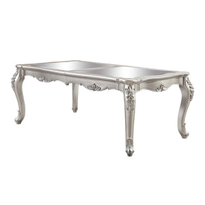 An ode to traditional glamour, the Devayne dining table brings in all the allure and charm that you are seeking for a dining table. The table features an extension leaf that allows for additional dinner guests. The champagne finish enhances the beautiful 