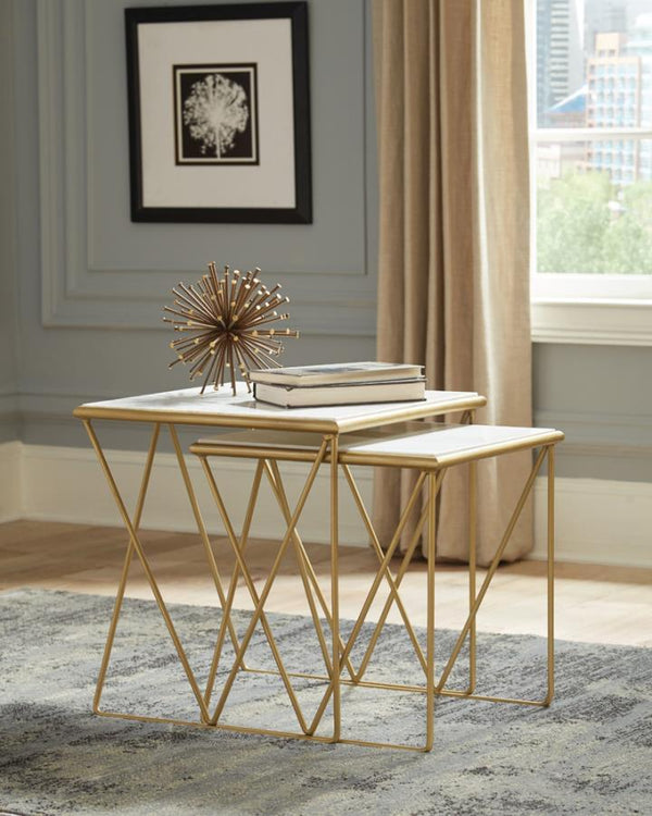  this two-piece nesting table set brings a sophisticated touch to any space. The rectangular white marble tops exude refined beauty