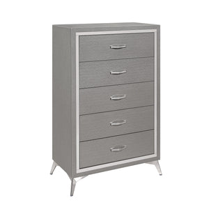 The Huxley 5-Drawer Chest in Gray combines contemporary glam with durable craftsmanship, making it a perfect addition to any modern bedroom. This chest is carefully crafted from manufactured woods and eco-friendly decorative laminate, ensuring it will las