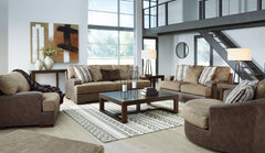 Punctuated by a subtle band of nailhead trim, this collection is perfect for those who love the look of leather. Two textural tones provide twice the style and comfortâ€”and incorporate an added layer of visual interest. Throw pillows add a fun decorative
