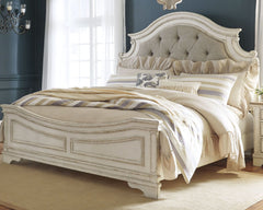 Elevating the art of traditional cottage styling, this queen upholstered bed is your dream bedroom retreat realized. A curvaceous beauty, this brilliant upholstered bed wows with dramatic scalloped details and fanciful trim work. The distressed chipped wh