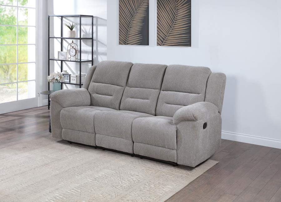 Take a relaxed and laid-back approach to seating with our manual reclining sofa, designed for ultimate relaxation. Wrapped in soft textured grey chenille fabric, this sofa offers a plush and inviting feel that enhances any living space. The manual recline