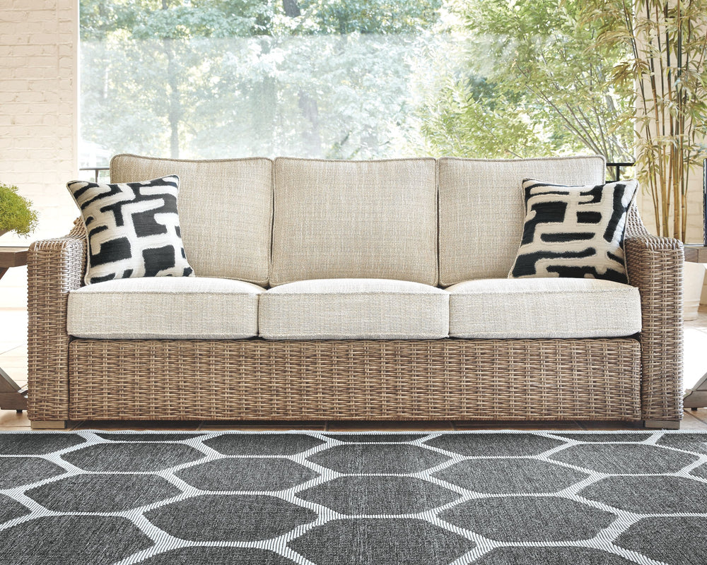 Sporting an easy-on-the-eyes look inspired by driftwood, this sofa elevates the art of alfresco living. Beautiful and durable enough for indoor and outdoor use, the high-style/low-maintenance seating entices with plush, removable cushions wrapped in Nuvel