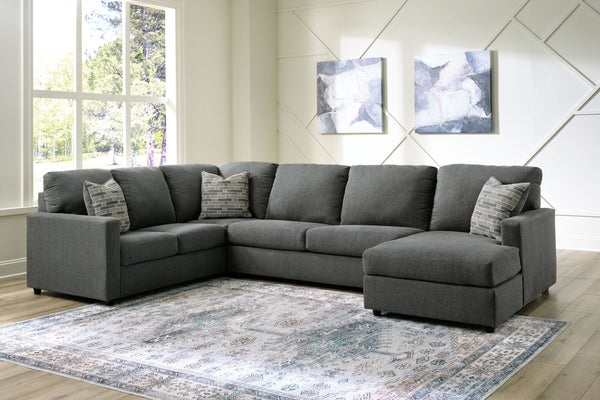 Contemporary fashion, meet superior form. This sectional with chaise is strikingly streamlined with its track arms. Cozy cushions invite superior relaxation, while handsome charcoal upholstery speaks to tried-and-true modern color palettes. Simply kick ba