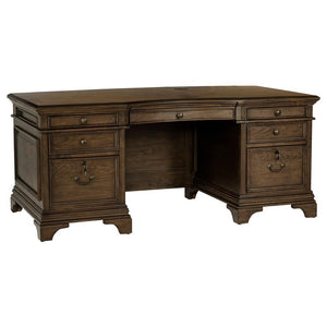 Feel like a CEO every day you sit down on this exquisite executive desk. Finished in burnished oak, it provides a traditional stylish flair to your office space. Two felt-lined top drawers allow you to store small items while you lock valuables inside the