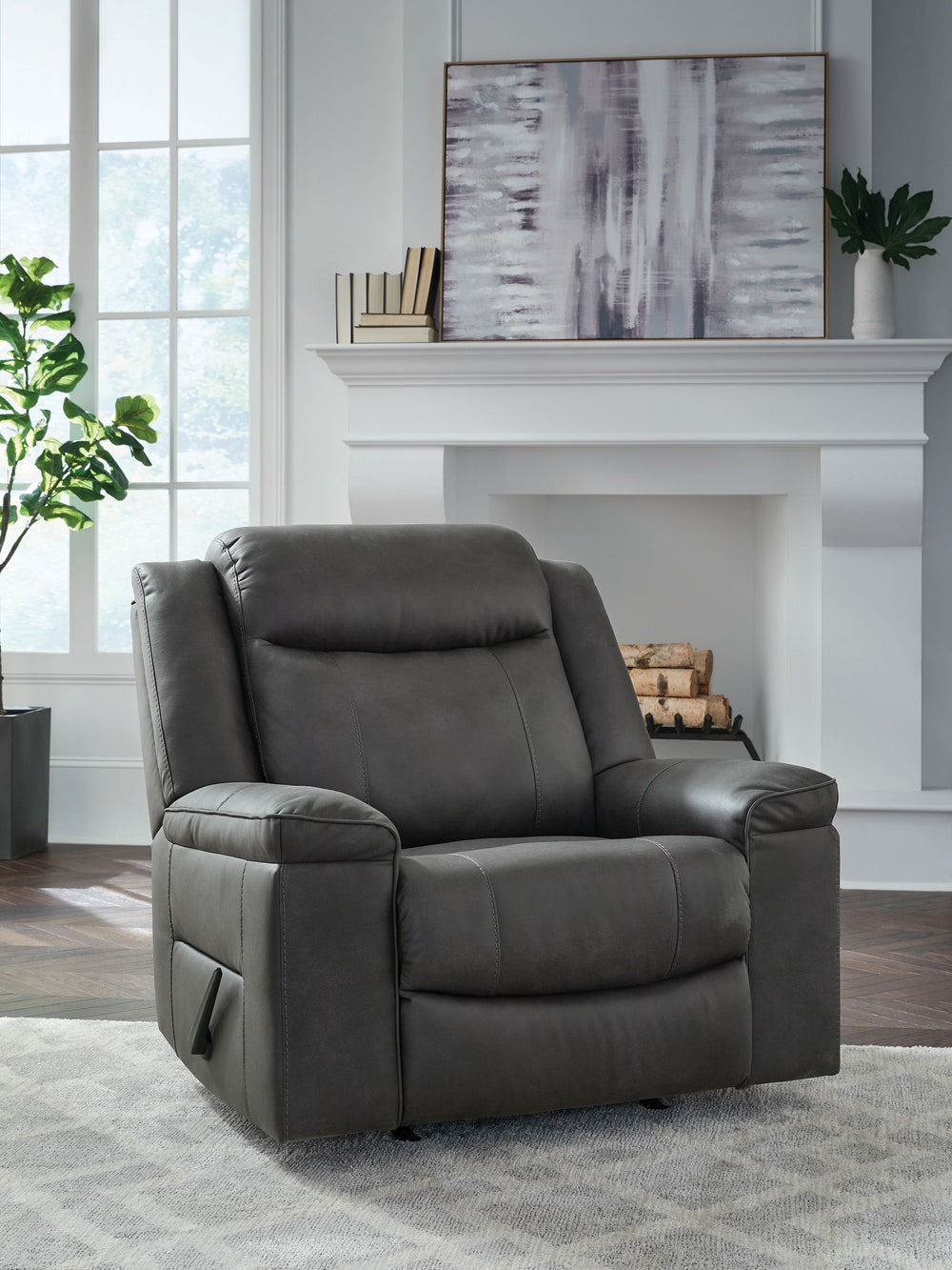 Indulge in larger-than-life style with this recliner. Intentionally crafted to provide extra support, its generously sized seat and high back invite you to sit back and settle in. When youâ€™re ready to recline, a smooth one-pull motion puts you in the co