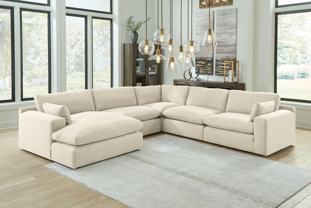 Down with uptown style. This sectional goes to town with a high-design aesthetic, sleek sophistication and sumptuous comfort that are temptingly affordable. Wide track arms, softened by plush side pillows, offer a welcoming look and feel, while back pillo