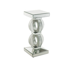 Make a striking statement in your home with this Ornat Accent Table. Featuring mirrored frame with faux diamond inlay, it creates a bold, yet elegant textured look. Classic pedestal base gives it an elegant support, with spectacular faux diamonds inlay ad