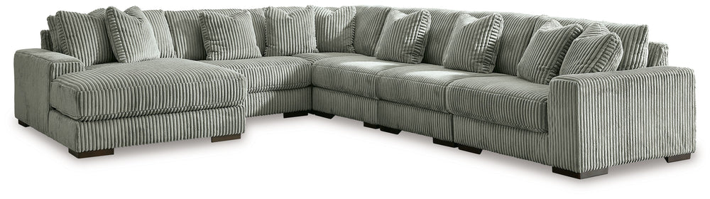 Plush and posh. Showcase your eye for on-trend texture with the statement-making cord upholstery of this sectional with chaise. Its stunningly soft fabric entices in a warm neutral hue, complementing contemporary color palettes. Sink into the cushions and