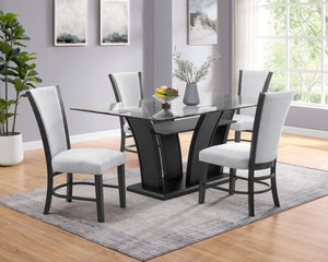 This sleek and modern dining group bridges form and function. The sculptural dining table has a sturdy base and the glass top allows views of the upholstered open shelf. Streamlined chairs and bench feature pewter finished wood and dove gray upholstery fo