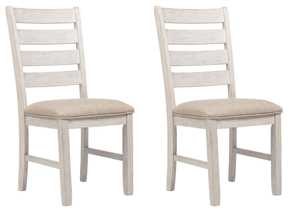 This dining chair invites you to raise the bar for small space living. An inspired choice for coastal chic or modern farmhouse settings, this comfortably cushioned chair sports a grayish white finish with rub through effect for timeworn appeal.<br><br><b>