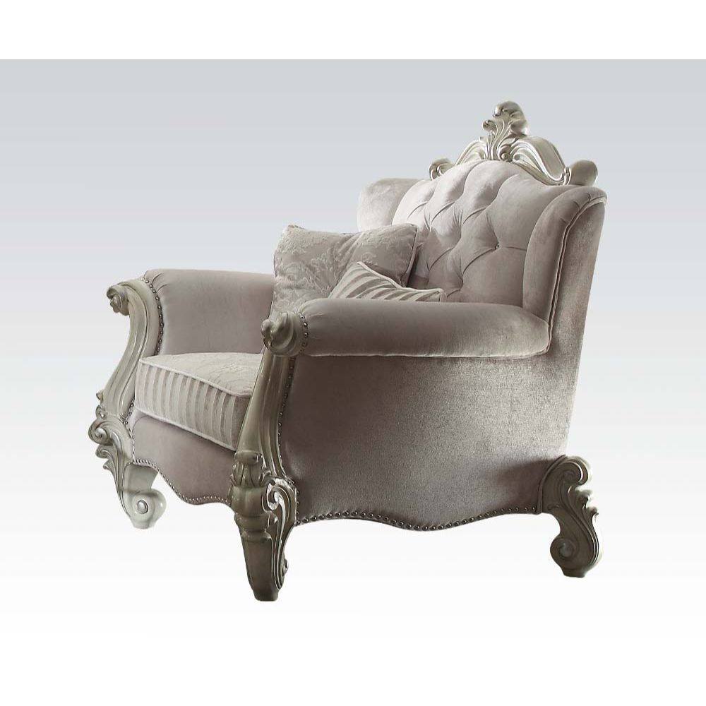 The Versailles collection with bone white finish will create you an elegant, warm and traditional taste in your living room. The sofa set reflects highly decorative base with scrolled feet, and the upholstered seats with the deep button tufted and Nailhea