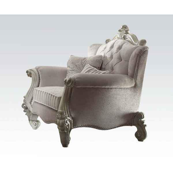 The Versailles collection with bone white finish will create you an elegant, warm and traditional taste in your living room. The sofa set reflects highly decorative base with scrolled feet, and the upholstered seats with the deep button tufted and Nailhea