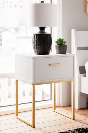  this nightstand is inspired by chic design. A matte white finish and goldtone accents offer an elegant touch to this so-cool piece. It beautifully blends the hues of natural living with the edginess of your modern lifestyle.<br/><br/><b>