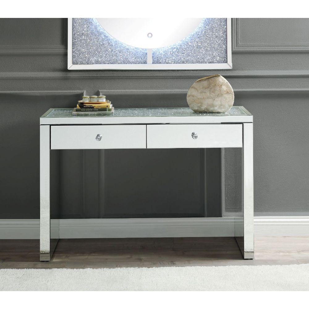 Assembled, Rectangular Console Table Storage: 2 Drawers Features: Mirrored Top w/Faux Diamonds & Clear Glass, Mirrored Sled Base (Open Base) CONSTRUCTION: Mirrored Sled-Frame: 4mm Mirror w/Beveled Edge, MDF () Top: Mirrored Trim, Faux Diamonds Inlay, 4mm 