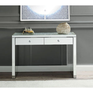 Assembled, Rectangular Console Table Storage: 2 Drawers Features: Mirrored Top w/Faux Diamonds & Clear Glass, Mirrored Sled Base (Open Base) CONSTRUCTION: Mirrored Sled-Frame: 4mm Mirror w/Beveled Edge, MDF () Top: Mirrored Trim, Faux Diamonds Inlay, 4mm 