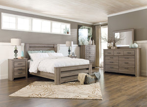 Warm gray sophisticated vintage finish with white wax effect over replicated oak grain. Tall generously scaled cases with wide pilaster, finished off with gently curved foot. Large dark pewter color handles with an aged appearance accent cases. Modern sty