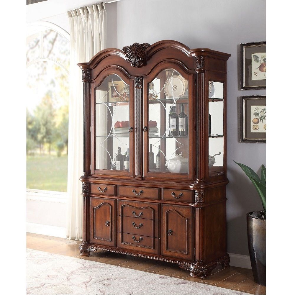The Chateau De Ville hutch and buffet offers you plenty of space for all your fine dining accessories from napkin rings to serving platters. The top cabinet is accessed via two tall, arched doors and is outfitted with clear glass panels on the front and s