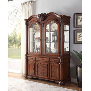 The Chateau De Ville hutch and buffet offers you plenty of space for all your fine dining accessories from napkin rings to serving platters. The top cabinet is accessed via two tall, arched doors and is outfitted with clear glass panels on the front and s