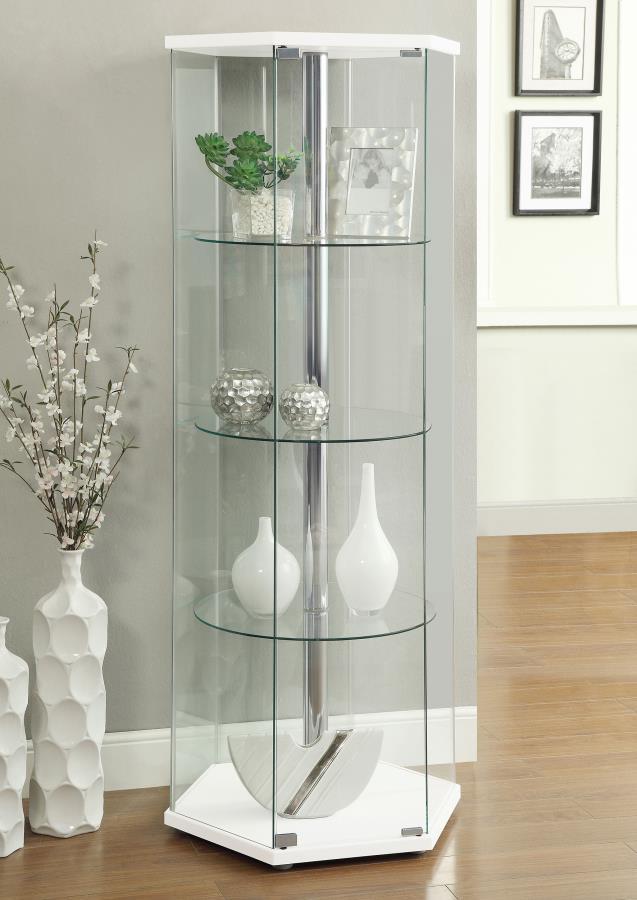 A fetching silhouette blends modern architecture with a fashionable finish. This curio cabinet illustrates the benefit of geometric design. A hexagonal shape offers an enticing look in a contemporary space. Finished in radiant white, it delivers fresh ene
