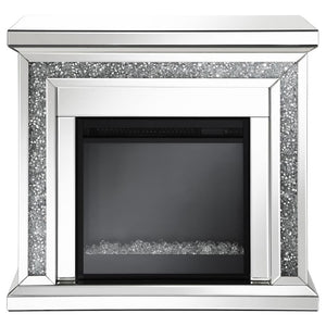  this freestanding electric fireplace offers a relaxing glow to a space. For a bit of warmth