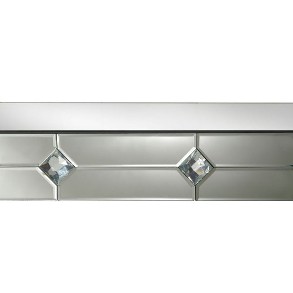 The Hessa mirrored console table demonstrates sophisticated, graceful, elegant style with its unique design. While elegantly reflecting its surroundings, this console table combines glamour with modernism. Light is captured and reflected from all angle of