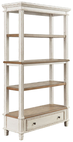 Elevating the art of traditional cottage styling, this bookcase is your heavenly home office realized. Its antiqued two-tone aesthetic blends a chipped white with a distressed wood tone top for added charm. The bookcaseâ€™s clever balance of shelf and dra