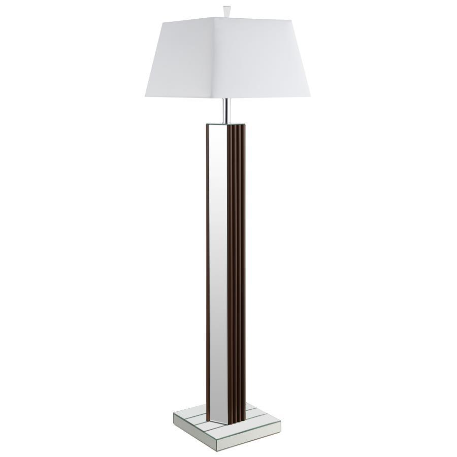Introduce a dose of character and sophistication with a modern floor lamp. It boasts a chic towering silhouette, complete with a deep brown finish and scallop details that create a fresh touch of texture and dimension. Mirrored panels add contrast and bri