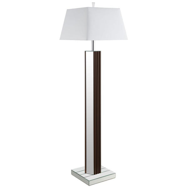 Introduce a dose of character and sophistication with a modern floor lamp. It boasts a chic towering silhouette, complete with a deep brown finish and scallop details that create a fresh touch of texture and dimension. Mirrored panels add contrast and bri