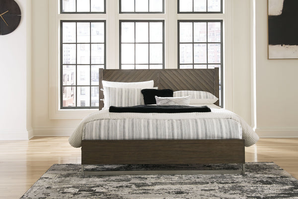 Clean lines lend sophistication and structure to this California king panel bed. Its complex rich grayish brown finish, slats set in a contemporary herringbone pattern, and low-profile footboard create visual interest and add to this bed-'s contemporary v