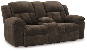 With its large-scale design, this extra-spacious reclining loveseat with console is a masterclass in accessible style. Plush, ultra-soft upholstery keeps everyone cozy as you lounge with family or guests. In a neutral hue, it seamlessly suits different ae