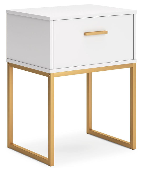Light and bright, this nightstand is inspired by chic design. A matte white finish and goldtone accents offer an elegant touch to this so-cool piece. It beautifully blends the hues of natural living with the edginess of your modern lifestyle.<br/><br/><b>