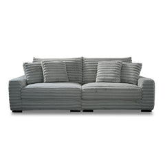 This two-piece Embrace sofa in gray is designed to transform your living space into a haven of comfort and style. Made from 100% polyester fabric with a plush, blanket-like texture, it promises ultimate relaxation. The set includes a right arm facing chai