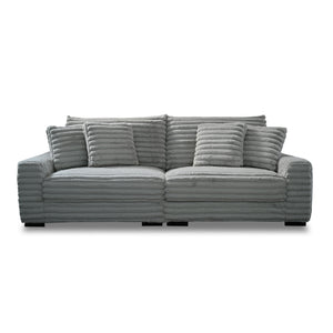 This two-piece Embrace sofa in gray is designed to transform your living space into a haven of comfort and style. Made from 100% polyester fabric with a plush, blanket-like texture, it promises ultimate relaxation. The set includes a right arm facing chai