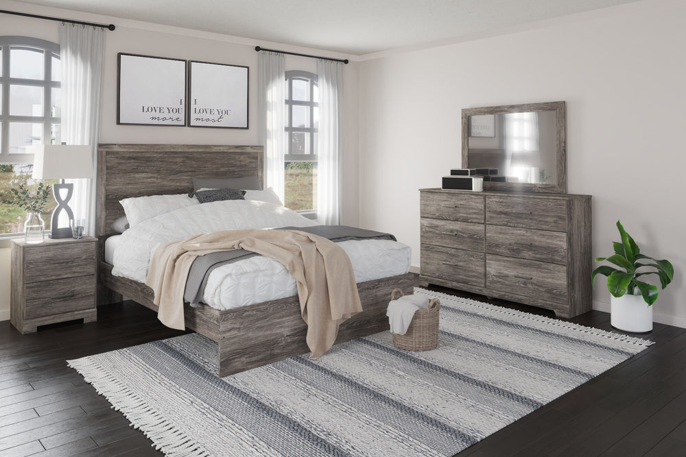 With its clean-lined look and modern attitude, this nightstand is a fresh style awakening. A warm gray hue over replicated oak grain easily complements other furniture finishes. Smooth drawer fronts with antiqued pewter-tone handles complete the aesthetic
