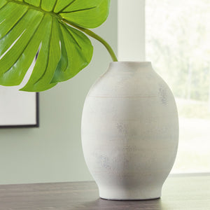  this vaseâ€™s trend-right sage green finish makes a chic impression. Ceramic craftsmanship gives it a timeless feel. What an artful addition to your tablescape