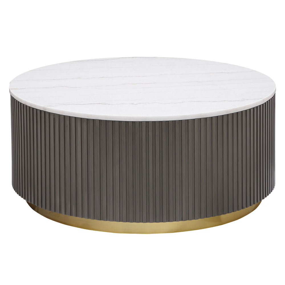 Center your living space with this elegant, modern round coffee table. The genuine white marble top exudes sophistication with its subtle veining, adding organic flair. The clean, light coloration complements any surrounding decor. A ribbed, engineered wo