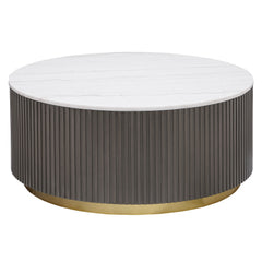 Center your living space with this elegant, modern round coffee table. The genuine white marble top exudes sophistication with its subtle veining, adding organic flair. The clean, light coloration complements any surrounding decor. A ribbed, engineered wo